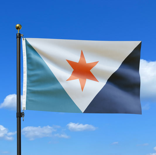 The city flag of Syracuse, NY affixed to a flag pole blowing in the wind
