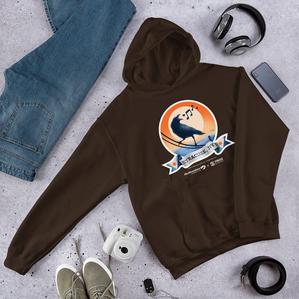 A dark chocolate-colored hoodie featuring an illustration of a crow on a telephone wire and a banner beneath it that says Syracuse, NY