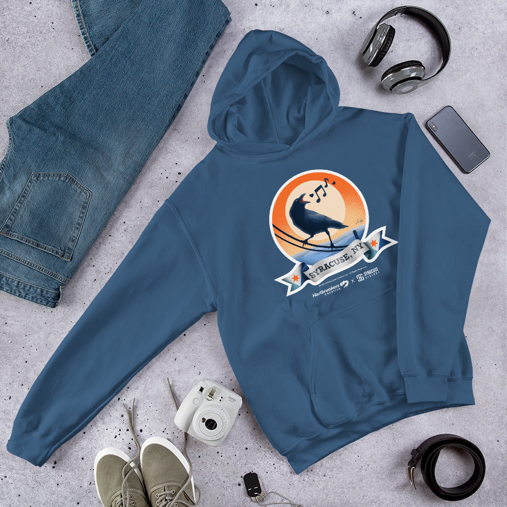 An indigo blue hoodie featuring an illustration of a crow on a telephone wire and a banner beneath it that says Syracuse, NY