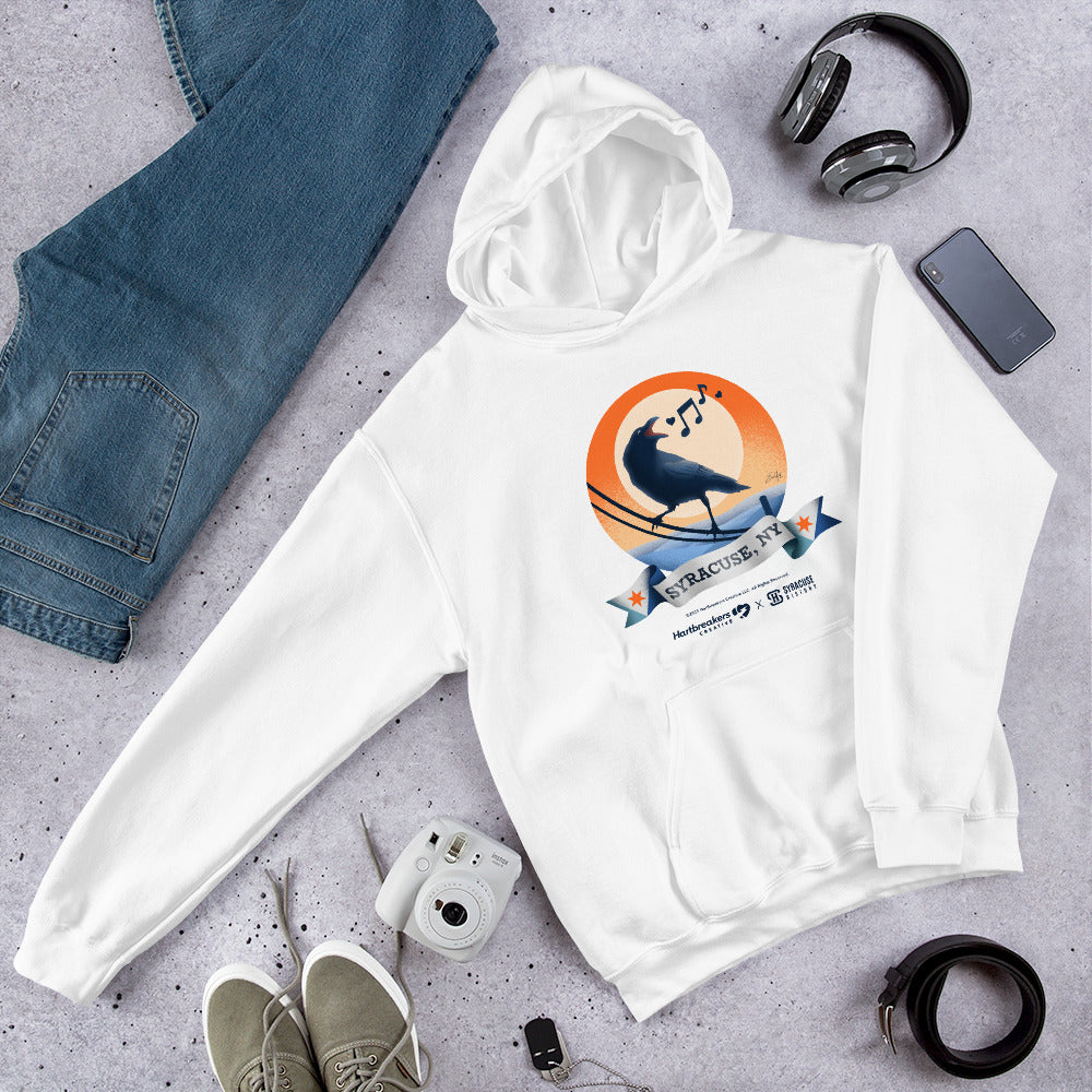 A white hoodie featuring an illustration of a crow on a telephone wire and a banner beneath it that says Syracuse, NY